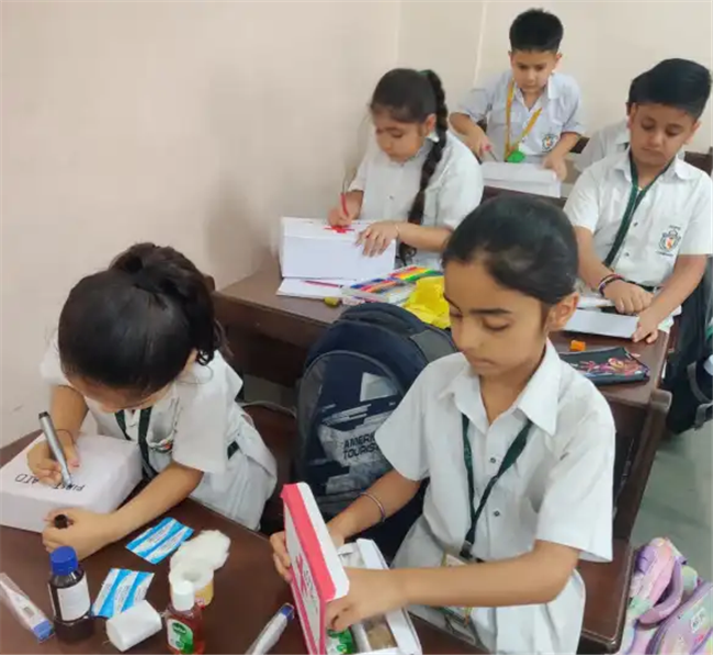 Class II organised “First Aid Box Making Activity”