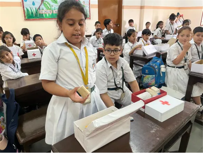 Class II organised “First Aid Box Making Activity”