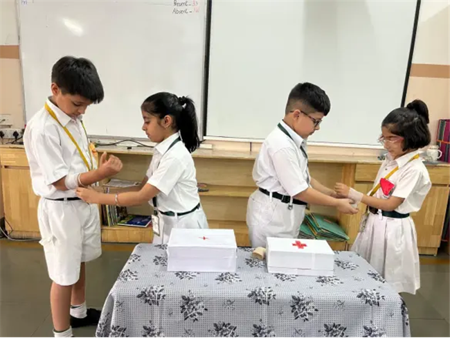 Class II organised “First Aid Box Making Activity”