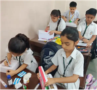 Class II organised “First Aid Box Making Activity”