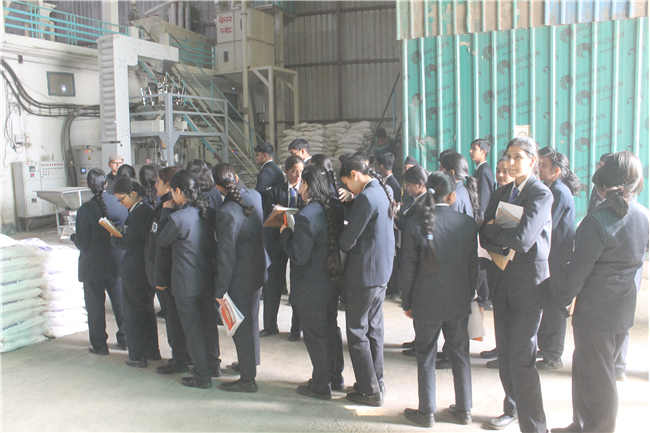 Class XI Commerce students on a field visit to Belwal Bhog Atta