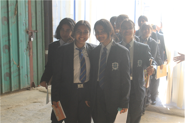 Class XI Commerce students on a field visit to Belwal Bhog Atta