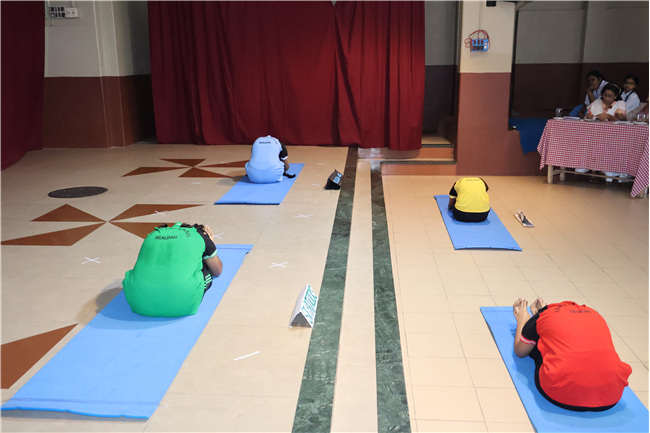 Celebrating International Yoga Day and Inter-House Yoga Competition Report