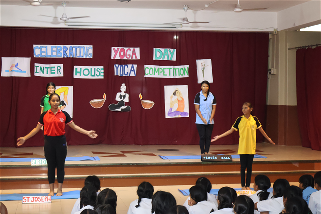 Celebrating International Yoga Day and Inter-House Yoga Competition Report