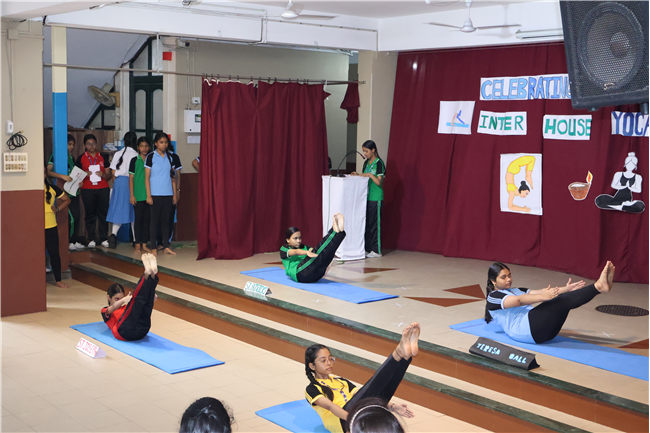 Celebrating International Yoga Day and Inter-House Yoga Competition Report