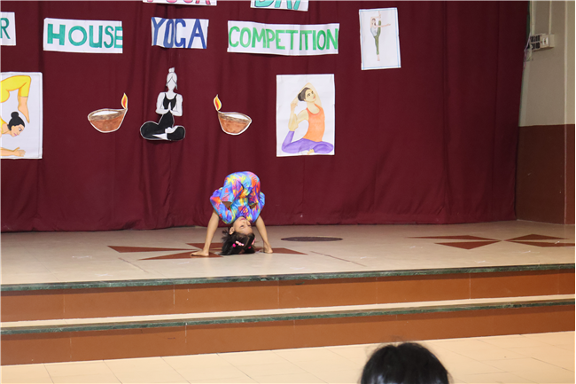 Celebrating International Yoga Day and Inter-House Yoga Competition Report