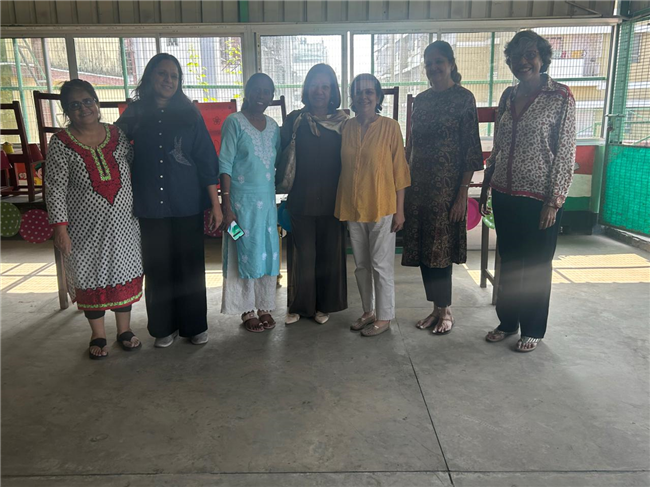 Distribution of food packets to the students of the Loreto Literacy Centre