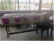 Distribution of food packets to the students of the Loreto Literacy Centre