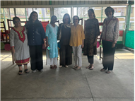 Distribution of food packets to the students of the Loreto Literacy Centre