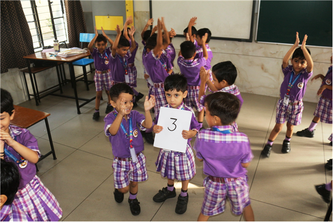 CHAIR ZUMBA WITH NUMBERS ACTIVITY  OF CLASS L.K.G.
