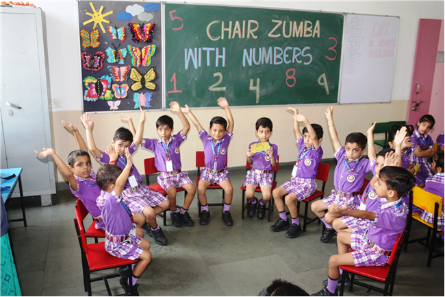 CHAIR ZUMBA WITH NUMBERS ACTIVITY  OF CLASS L.K.G.