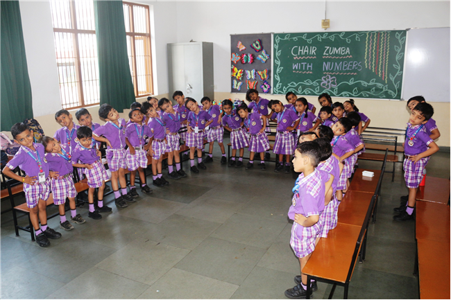 CHAIR ZUMBA WITH NUMBERS ACTIVITY  OF CLASS L.K.G.