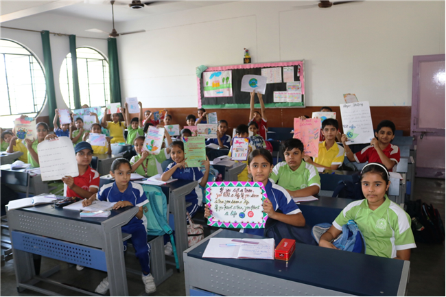 SLOGAN WRITING ACTIVITY OF CLASS III, IV, V