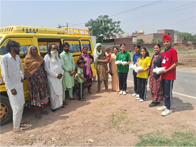 Wheat Flour Distribution by Students – Our Lady of Fatima Convent School, Assarpur