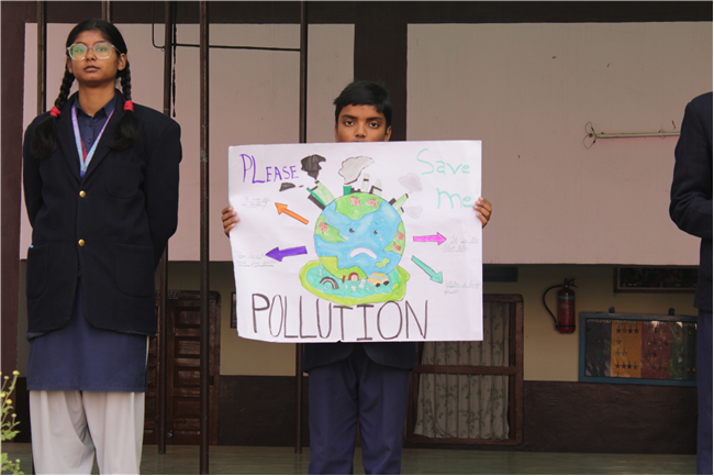 Assembly by Class 7-A; Topic - National Pollution Control Day, 2nd Dec. 2025