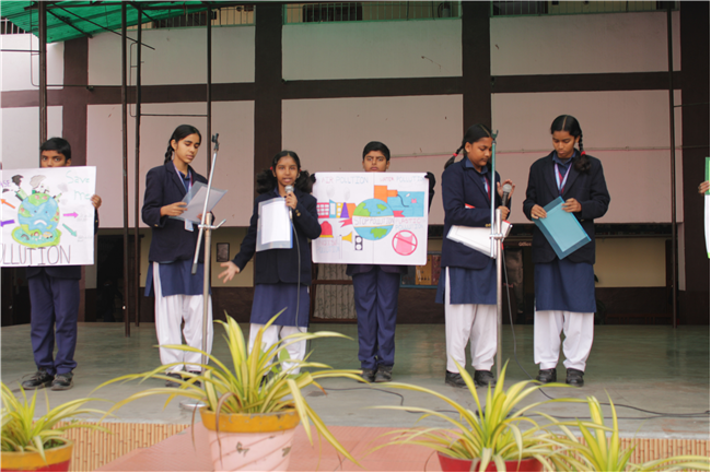 Assembly by Class 7-A; Topic - National Pollution Control Day, 2nd Dec. 2025