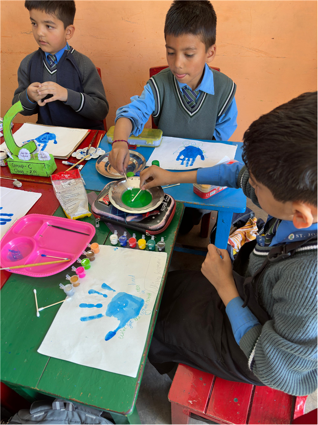 Class 2-A Activity (Our Earth – Hand Painting and Ear Bud Painting)