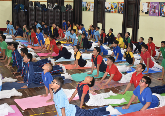 SPECIAL ASSEMBLY ON  INTERNATIONAL YOGA DAY Class IXC 21 June 2025  The assembly began with a morning prayer, followed by a thought-provoking article on the significance of yoga and its global recogni